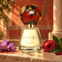Agatho Castiamanti beside purple saffron crocus, a red rose, and laurel against a sunlit Pompeii-inspired fresco wall.