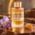 ArteOlfatto Bois Precious on sculpted walnut with a lavender iris, myrrh resin, and honeycomb in warm golden light.