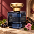 Atelier Materi Burgundy Oud with blackcurrants, oud wood, and pink geranium against a softly lit burgundy backdrop.