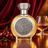 Boadicea the Victorious Bodacious on polished cherrywood beside cherries, cloves, and cognac, with burgundy velvet and warm amber lighting.