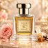 Bois 1920 Elite II perfume beside a blush rose, vanilla orchid and caramel in soft golden light.