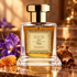 Bois 1920 Elite IV perfume with a purple iris, honeycomb and tobacco leaf in warm amber light.