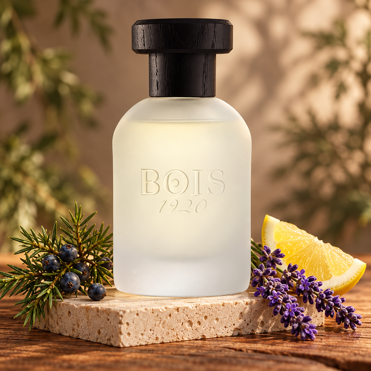 Bois 1920 Classic 1920 frosted bottle on a stone plinth beside juniper berries, purple lavender, and a lemon wedge in warm sunlight.