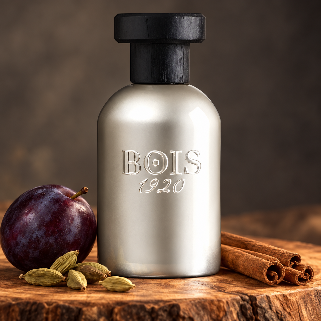 Bois 1920 Dolce di Giorno silver bottle with a whole plum, cardamom and cinnamon on warm cedarwood.