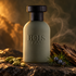 Bois 1920 Itruk on dark stone with cardamom, juniper berries and oud wood, lit by warm amber light and soft incense haze.