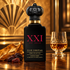 Clive Christian Blonde Amber on polished walnut beside tobacco, dried fruits, and a crystal glass of rum, against a golden Art Deco backdrop.
