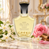 Creed Jasmin Imperatrice Eugenie shield-shaped bottle with jasmine, pink rose and sandalwood in a sunlit French salon.