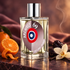 Etat Libre d’Orange Archives 69 on plum-colored stone beside mandarin, prunes, and an ivory orchid, with mauve satin and a faint incense wisp behind it.