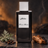 Franck Boclet Ashes on dark slate beside silvery wormwood, cloves, and charred-edge cedarwood, with warm amber light and a thin incense wisp behind it.