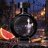 HFC Closed Gate’s illustrated black bottle beside grapefruit, peppercorns, and sandalwood, with a closed iron gate and warm lights in the twilight background.