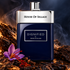 House of Sillage Dignified navy bottle with a saffron crocus and cloves on dark agarwood, framed by smoke and amber light.