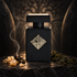 Initio Parfums Privés Magnetic Blend 8 stands between curved black stone forms, framed by a branching shadow, olibanum resin, incense smoke, and dark oakmoss.