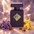Initio Psychedelic Love beside purple heliotrope, yellow ylang-ylang flowers, and myrrh resin on mauve stone in soft golden light.