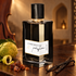 L’Orchestre Parfum Ambre Cello on dark wood with bergamot, myrrh resin, and vanilla pods, with a blurred cello and glowing alcove behind it.