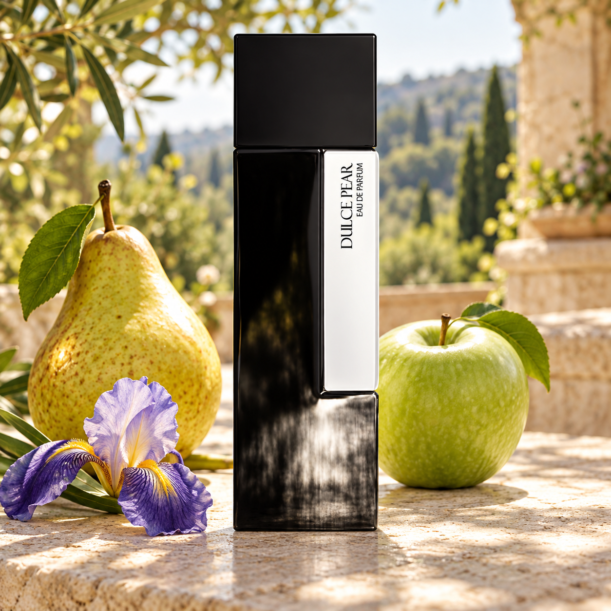 Laurent Mazzone Dulce Pear black bottle with whole pear, green apple and iris on a sunlit Italian terrace.