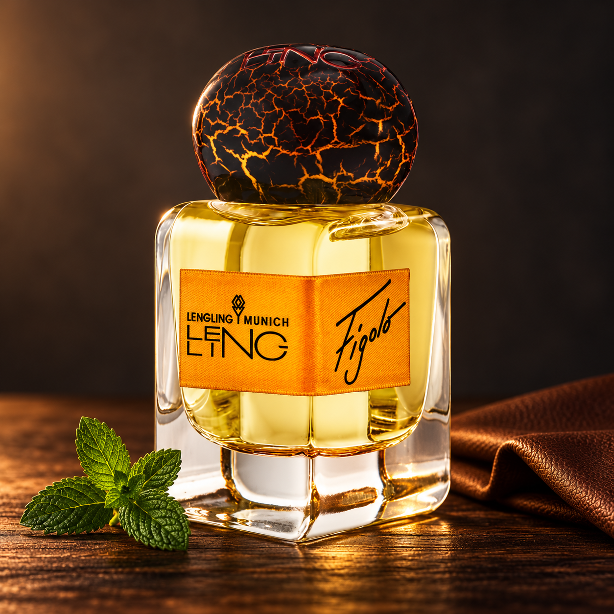 Lengling Figolo on dark wood with a fresh mint sprig and folded brown leather in warm amber light.
