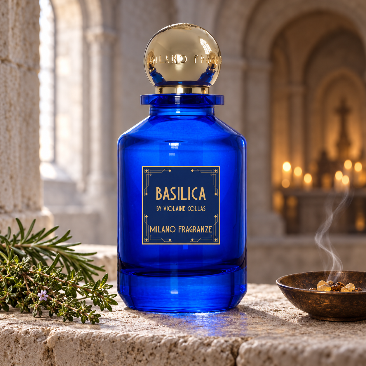 Milano Fragranze Basilica’s cobalt-blue bottle beside thyme, rosemary, and smoking incense on pale stone, with candlelit arches behind it.
