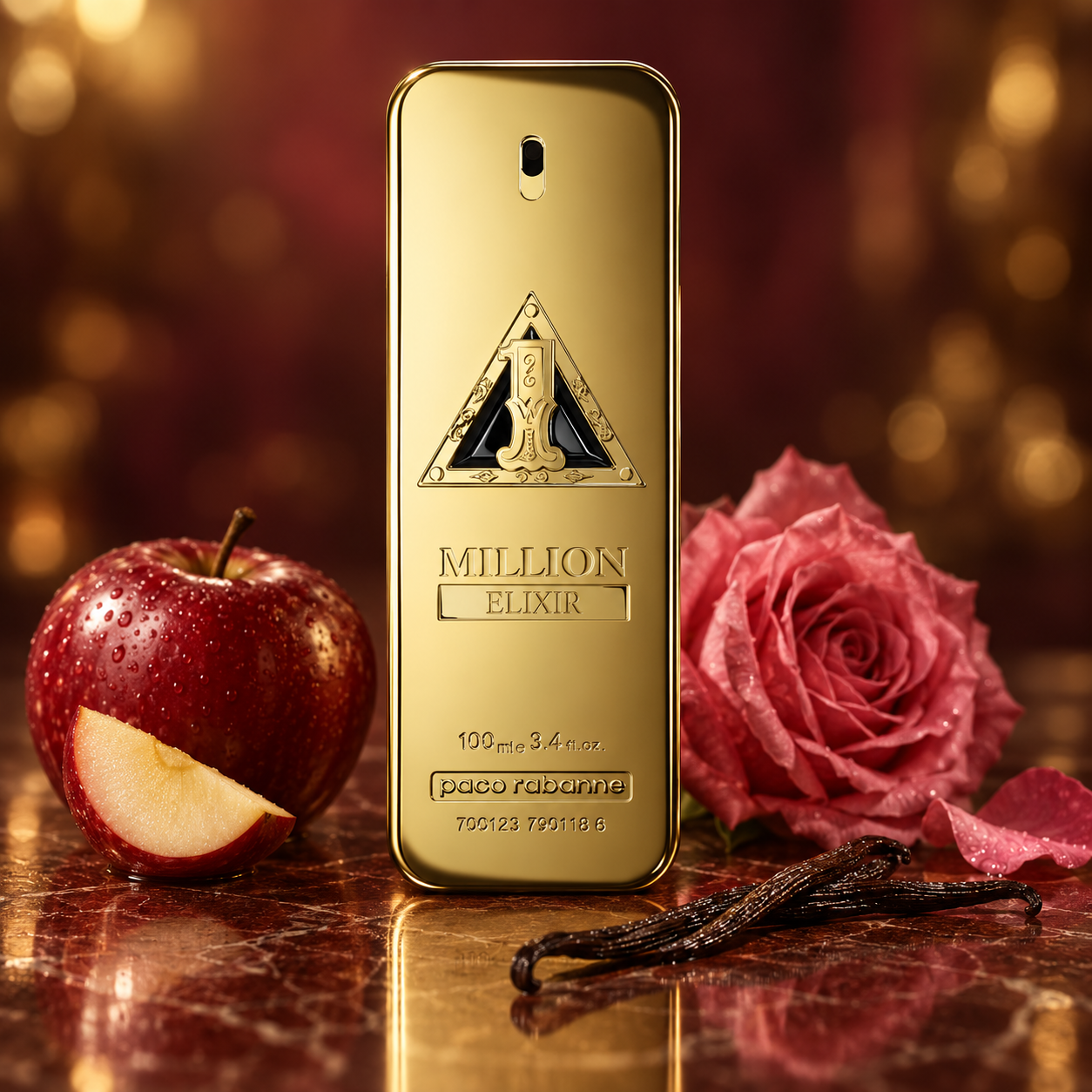 Paco Rabanne 1 Million Elixir gold bottle with red apple, pink rose, and vanilla pods in warm golden lighting.