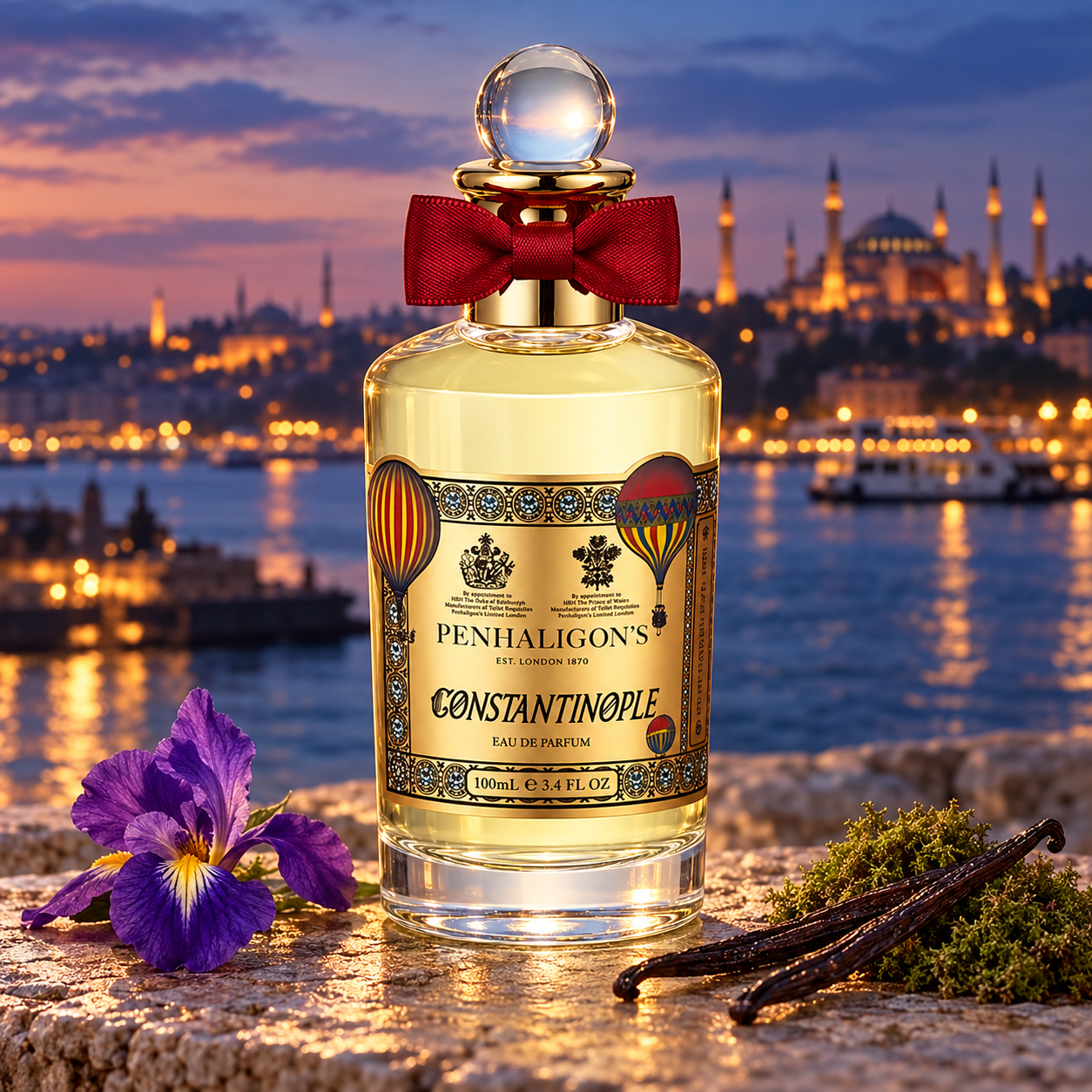 Penhaligon’s Constantinople bottle beside purple iris, vanilla pods, and moss on waterfront stone, with Istanbul’s illuminated skyline at dusk.