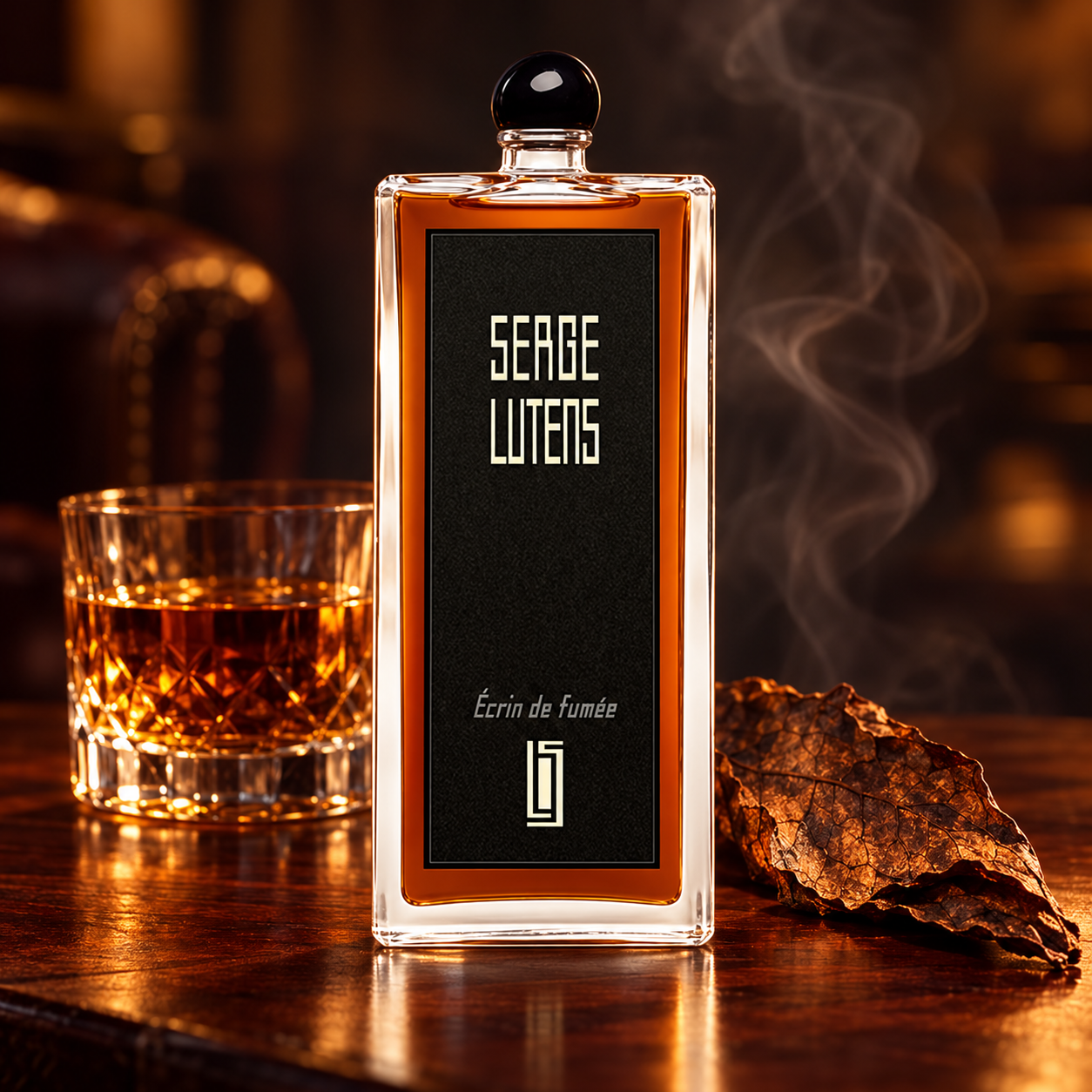Serge Lutens Écrin de Fumée bottle beside a glass of amber rum and tobacco leaf on dark wood with soft smoke.