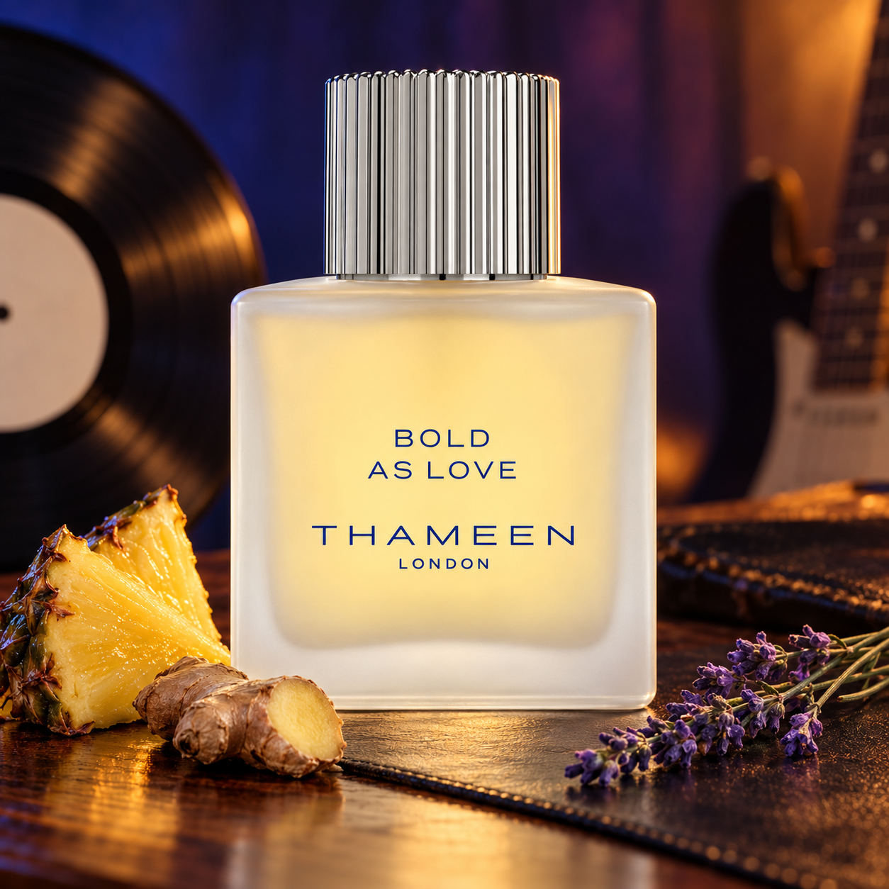 Thameen Bold As Love with pineapple, ginger, and lavender beside a vinyl record and softly blurred guitar in blue and amber light.