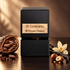 Tiziana Terenzi Al Contrario beside an open cacao pod, vanilla pods, a pale orchid, and hazelnuts on dark polished wood under warm light.