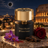 Tiziana Terenzi Caput Mundi with saffron crocuses, oud wood, and a burgundy rose overlooking illuminated Rome beneath a dark moon.