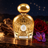 Tiziana Terenzi Dubhe gold bottle with oud wood, red rose and saffron crocus beneath a dark starry sky.