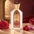 V Canto Arkano Degli Amanti on warm stone beside a pink rose, raspberries, and a purple saffron crocus, with crimson satin and soft golden light behind it.