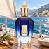 Xerjoff 40 Knots on a sunlit yacht table with cedarwood, greenery, and sea salt overlooking the Mediterranean coast.