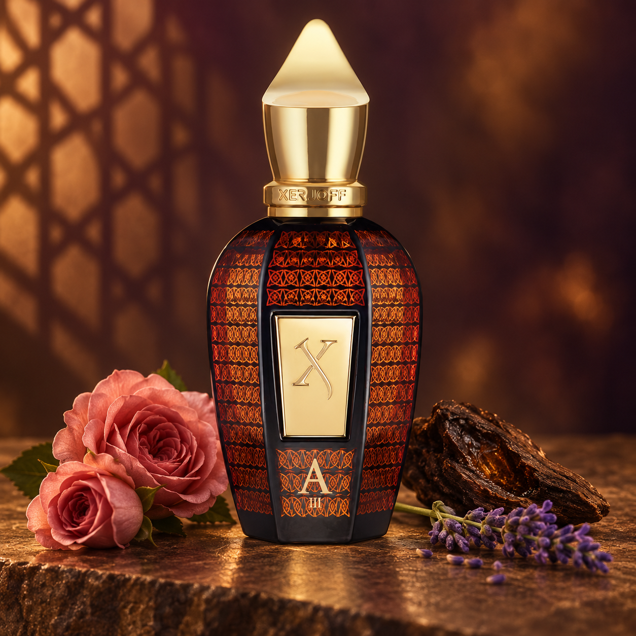 Xerjoff Alexandria III’s patterned bottle beside pink roses, oud wood, and lavender on warm dark stone, with soft geometric shadows behind it.