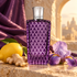The Merchant of Venice Damascus Desert purple bottle beside a whole lemon, ginger and iris on stone with plum silk in warm light.