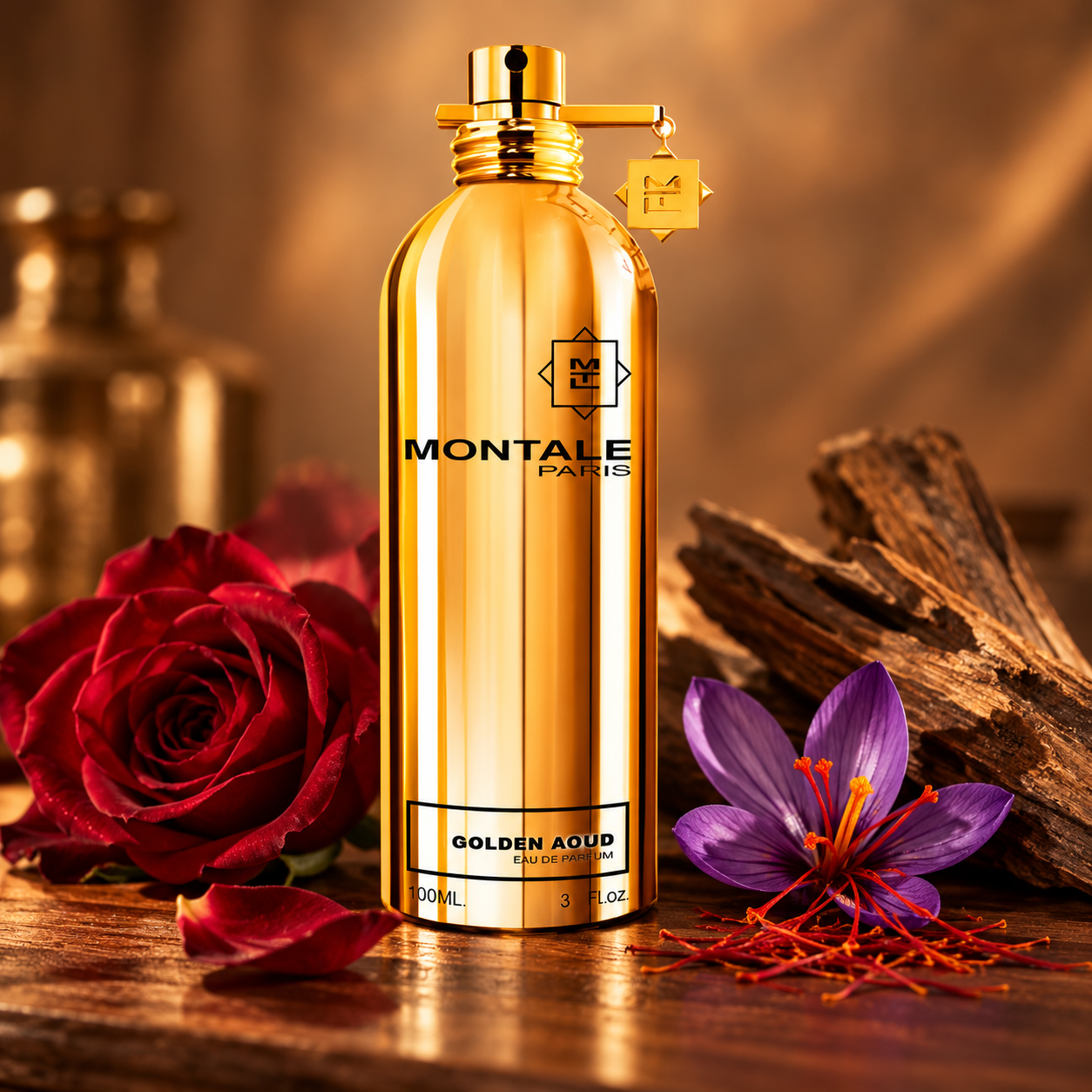Montale Golden Aoud bottle beside a red rose, saffron crocus and wood in warm bronze light.