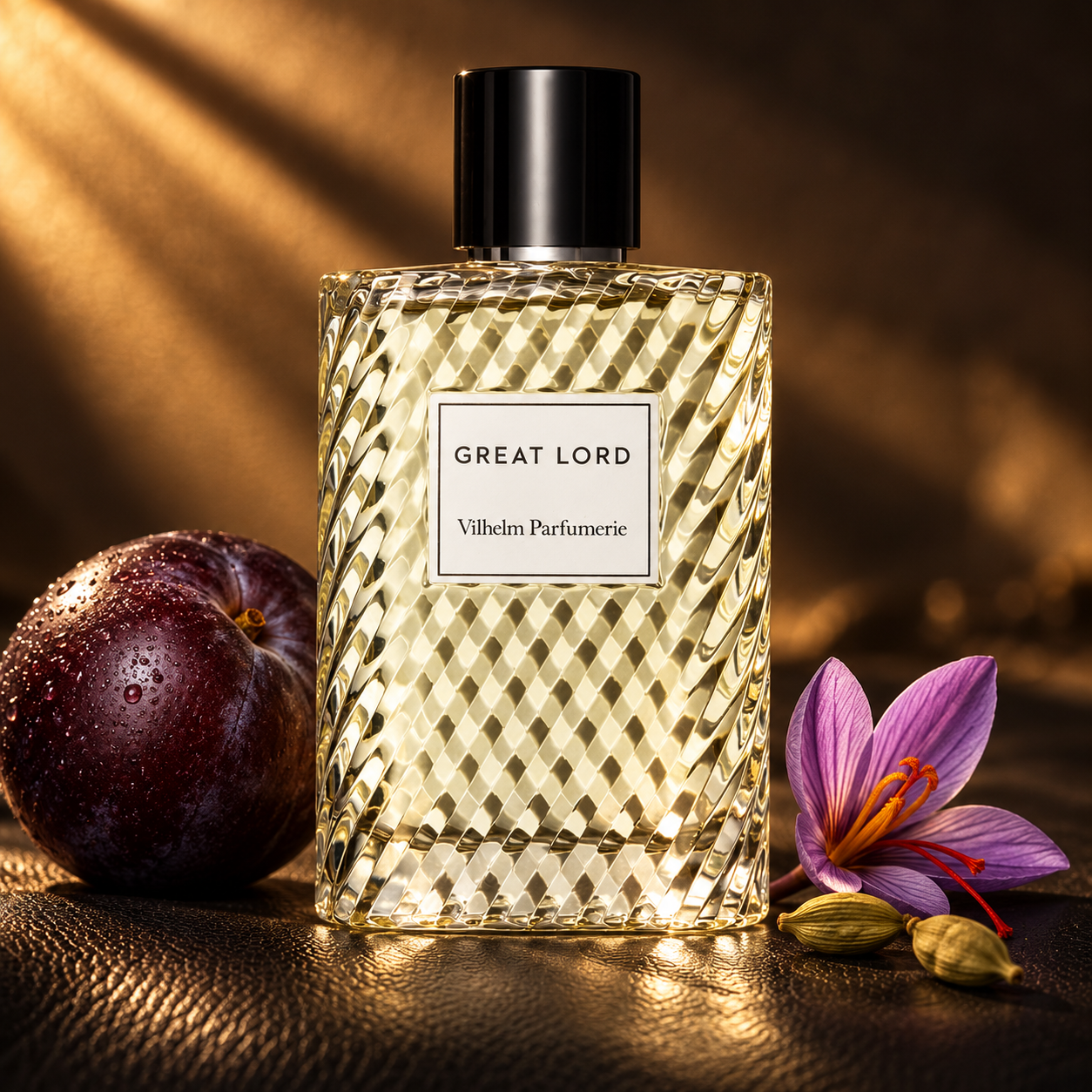 Vilhelm Parfumerie Great Lord faceted bottle with a whole plum, saffron crocus and cardamom on black leather in golden light.