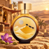 HFC Great Way bottle with camel artwork beside saffron crocus and cardamom overlooking a desert caravanserai at sunset.