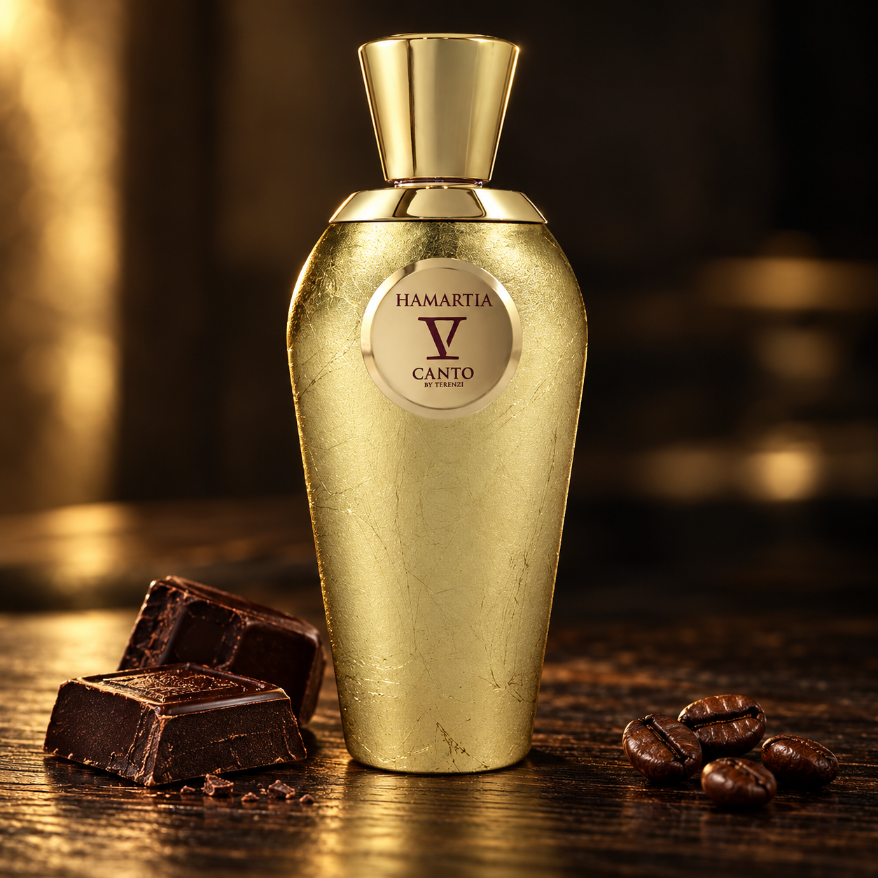 V Canto Hamartia on dark wood with chocolate pieces and coffee beans in warm gold light.