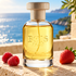 Bois 1920 Insieme on a sunlit seaside terrace with raspberries and a strawberry.