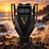Paco Rabanne Invictus Victory Absolu on volcanic rock with peppercorns and smoke beside ocean waves at sunset.